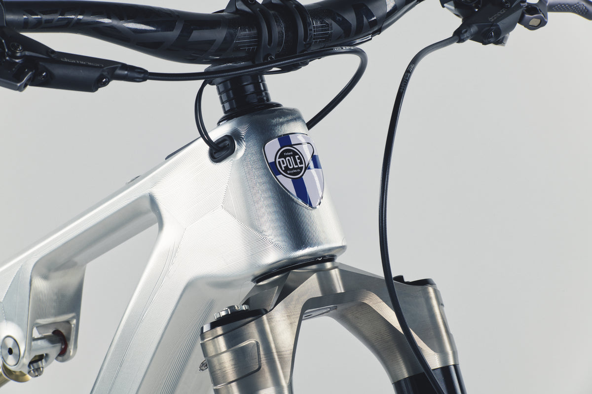 Pole Hiisi head badge closeup