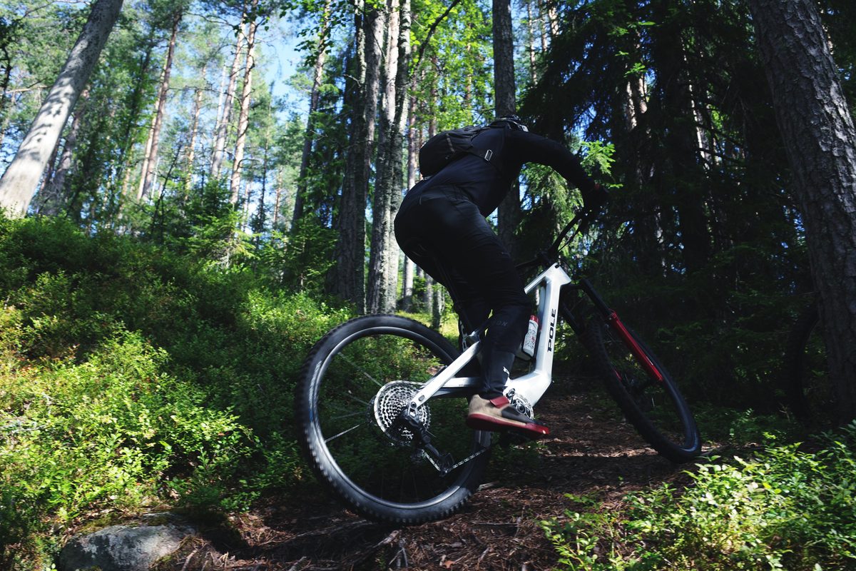 Climbing a steep forest trail in Muuratsalo on the Hiisi