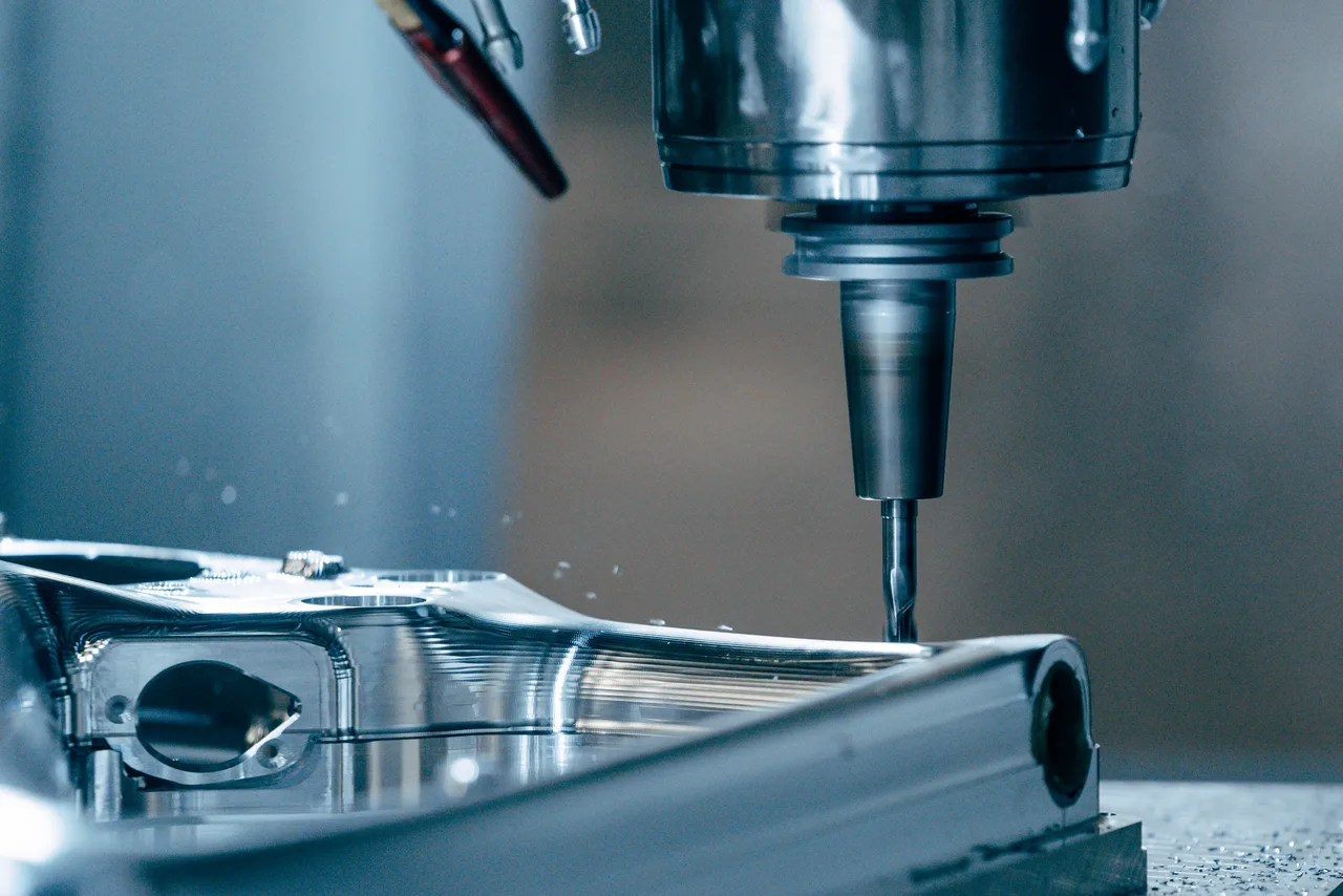 CNC machining a Voima frame component at Pole's factory in January 2022